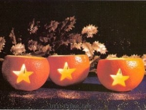 Artesanía para hacer portavelas de Halloween con naranjas Velas con naranjas 300x225 Artesanía para hacer portavelas de Halloween con naranjas